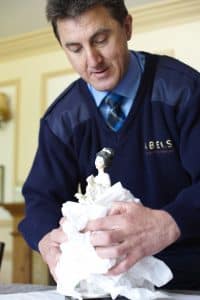Abels crew packing a statue