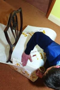 Abels crew packing a chair