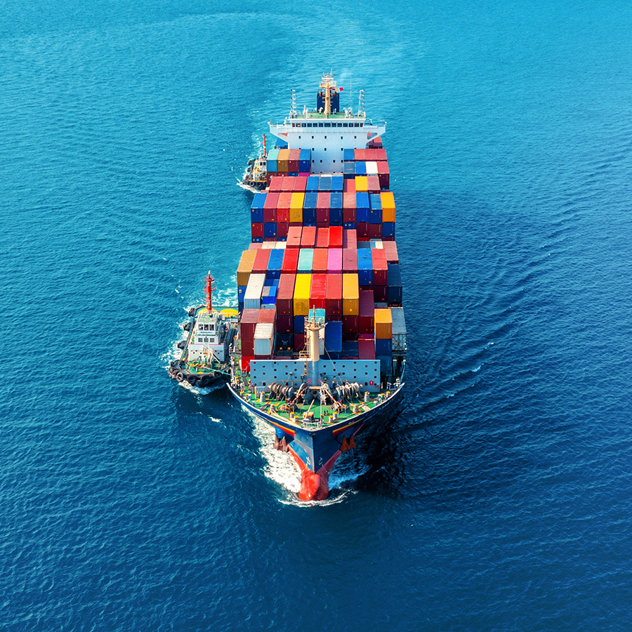 aerial view of cargo ship with cargo container on sea