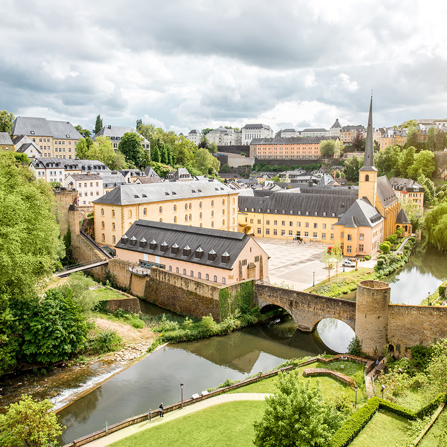 view on the grund district with saint johns church and neumunster abbey in luxembourg city