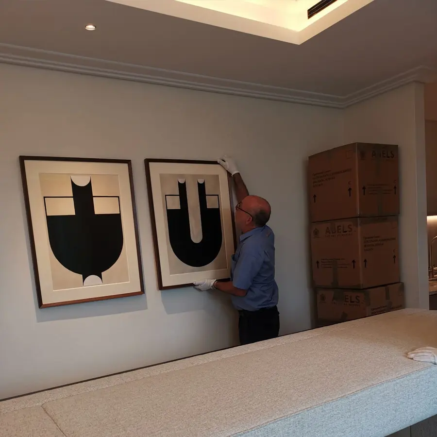 Abels crew putting frames on the wall