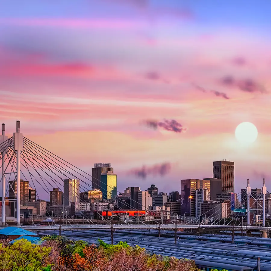 Johannesburg-city-skyline-and-Nelson-Mandela-bridge-at-sunset