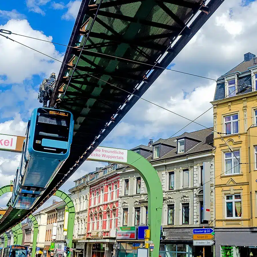 Main-street-of-Vohwinkel-a-urban-subdivision-of-Wuppertal-with-the-famous-Wuppertaler-Schwebebahn-in-North-Rhine-West